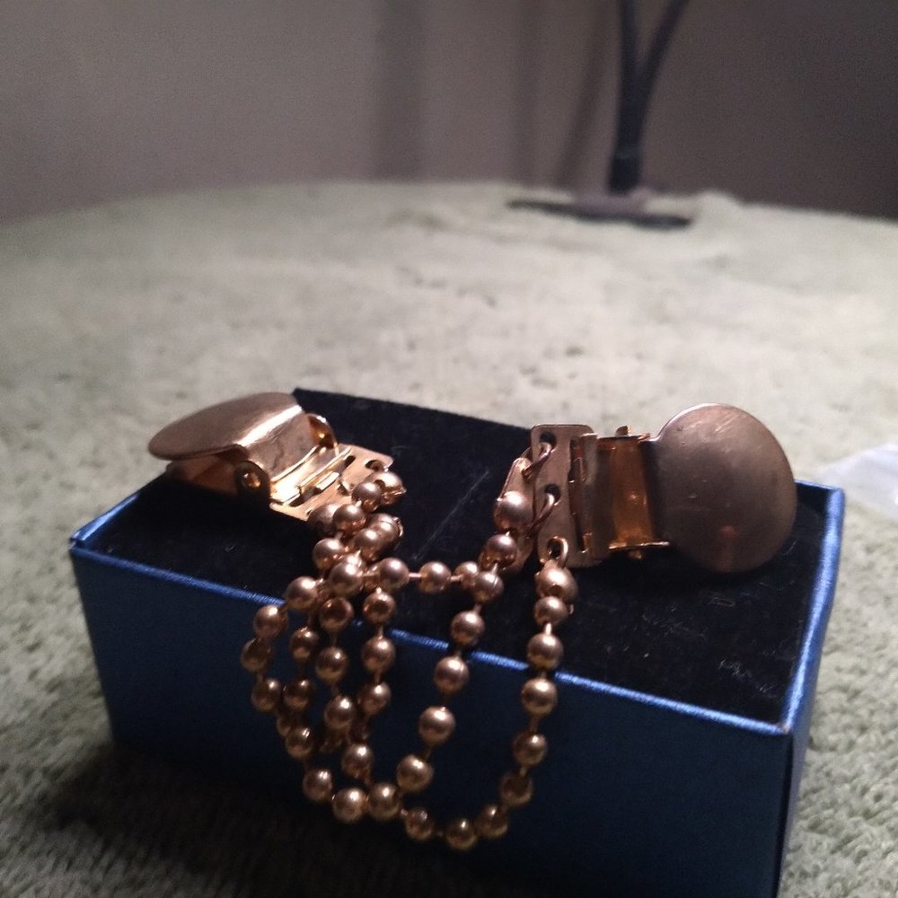 Copper color tie clip